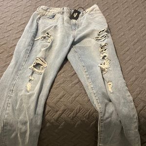 Vintage high rise jeans never worn size 11 (says 12 but there was no 11)
